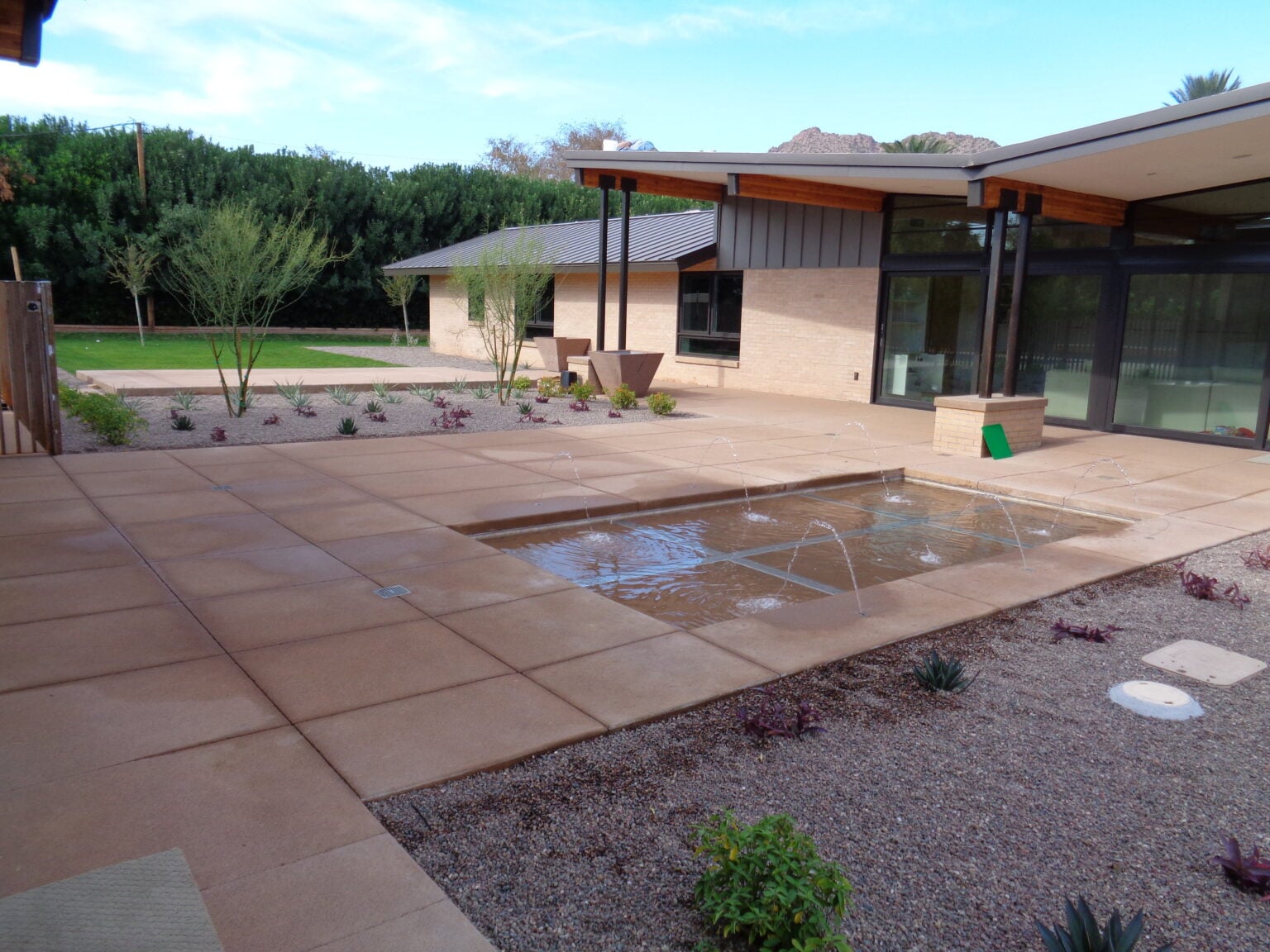 Acid-etched colored concrete patio